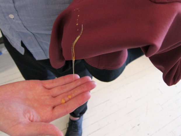 This is honey being poured onto an Outlier garment, pretty impressive. 
